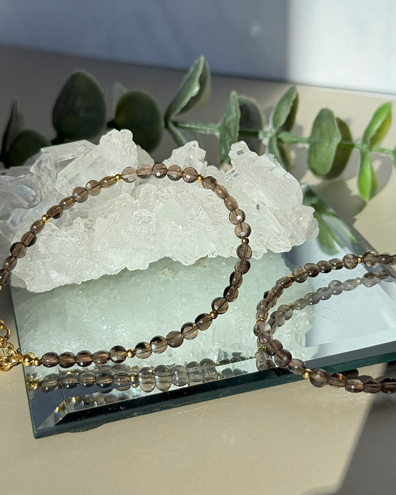 Facettiertes Rauchquarz Armband mit vergoldeten 925 Silberperlen