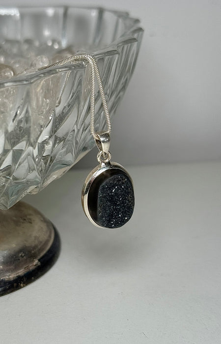 Onyx Anhänger eingefasst in 925er Silber