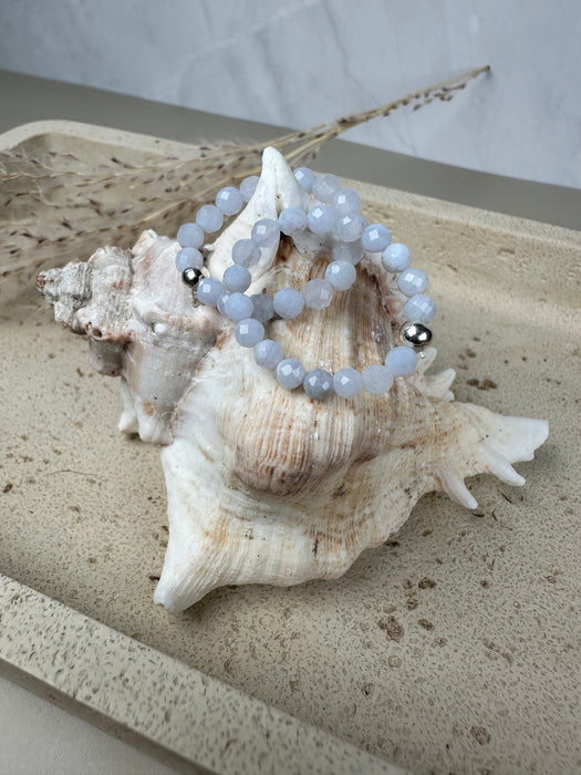 Blauer Chalcedon Perlenring – elastisch, mit 925er Silberperle Gr 52-55